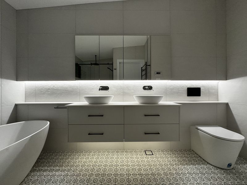 Full bathroom renovation with tiling and custom vanity, Newcastle